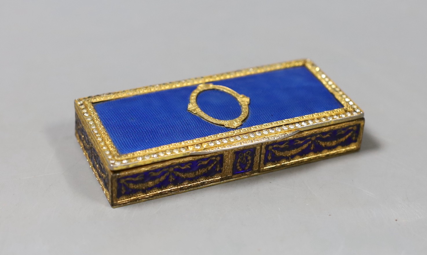 A gilt metal and blue enamel snuff box